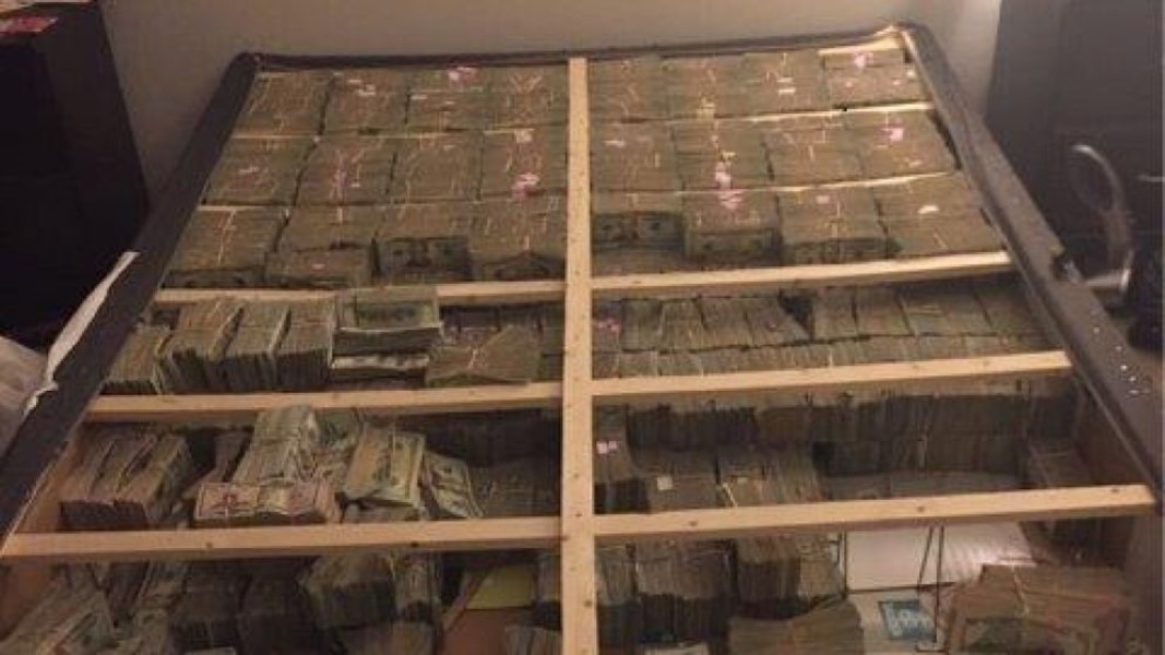Millions of dollars found hidden under mattress (1)
