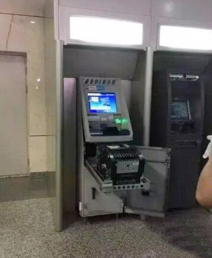 Woman Destroys ATM 3