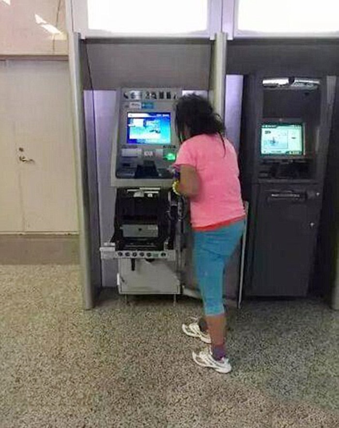 Woman Destroys ATM 2