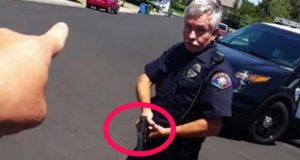 Cop Pulls Gun