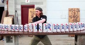 Slices Beer Cans With Sword